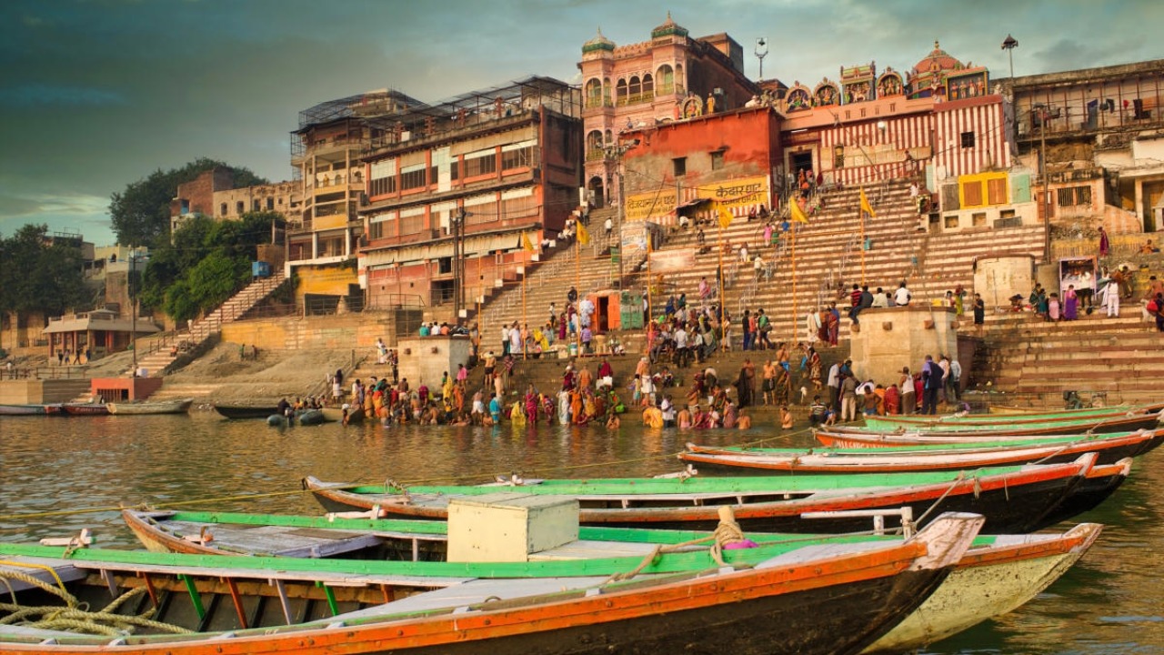 Devotees and boats along the Varanasi ghats